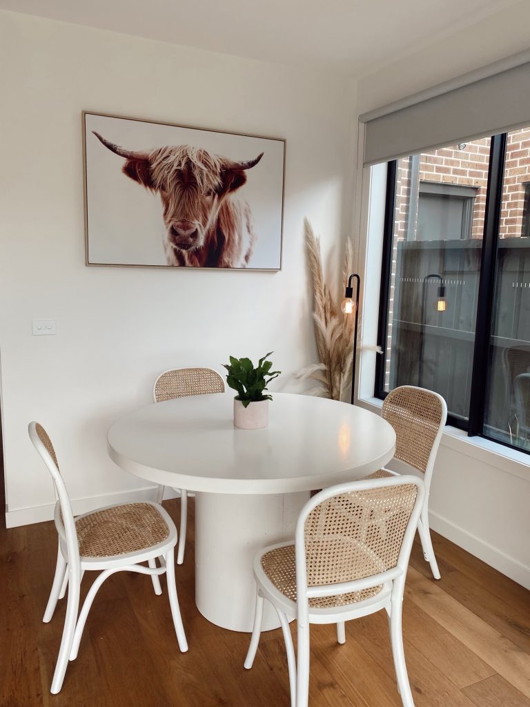 Classic White Round Dining Table with a Concrete Leg